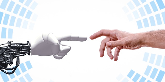 robot and human hands pointing at each other